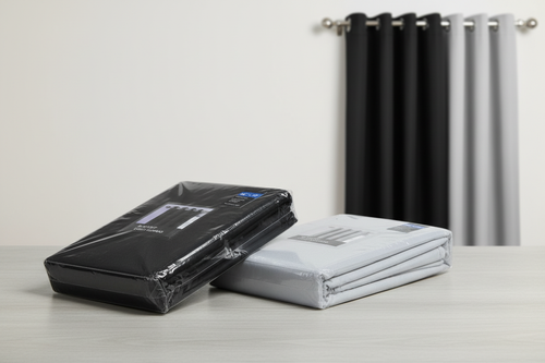 Blackout eyelet curtains in black and white